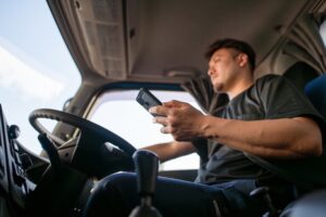 Read more about the article What Are Common Truck Driver Distractions?